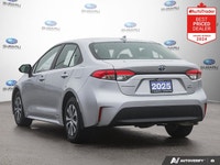 Odometer is 1478 kilometers below market average! Gray 2025 Toyota Corolla Hybrid LE AWD Continuousl... (image 2)