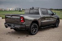This Ram 1500 has a dependable Twin Turbo Regular Unleaded I-6 3.0 L/183 engine powering this Automa... (image 3)