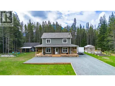 Welcome to your dream country retreat in Jackpine Flats! This stunning farmhouse-style two-storey ho...