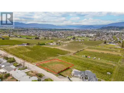 Build your estate home on this wonderful half-acre lot with exceptional views over orchards and farm...