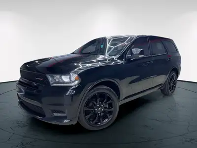 Experience the perfect blend of power and elegance with the black 2019 Dodge Durango GT AWD. Designe...