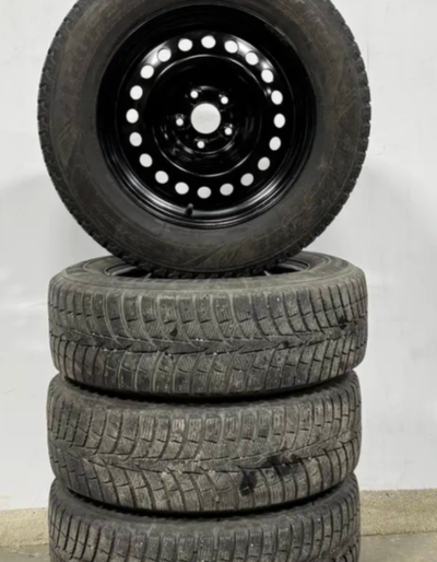 Like new hankook Laufenn 2356517 235/65R17 snow winter ice 235 65 17 tires on 5x114.3 Steel rims wit...