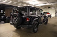 This Jeep Wrangler has a dependable Gas/Electric V-6 3.6 L/220 engine powering this Automatic transm... (image 6)