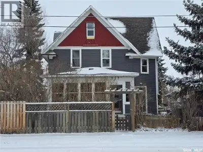 Welcome to 717 Coteau Avenue in Weyburn, SK, a stunning 1912 2.5-storey character home offering 2,16...