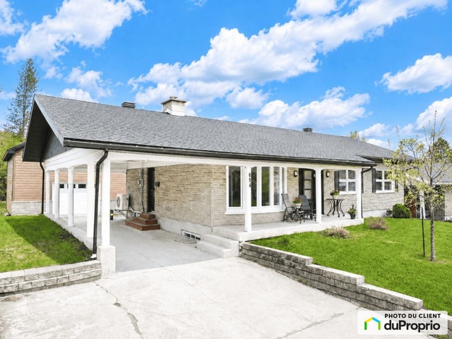 $794,000 - Bungalow for sale in Ste-Foy — photo 1