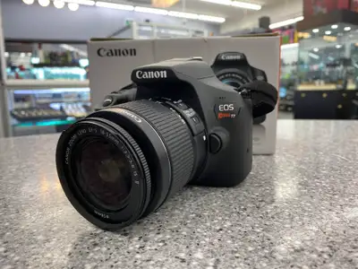 Canon EOS Rebel T7 24.1MP DSLR Camera Item# 1409496 -Includes an original box, power supply and a le...