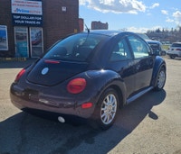 Turn heads and rediscover the joy of driving with this classic 2005 Volkswagen Beetle in a stunning... (image 6)