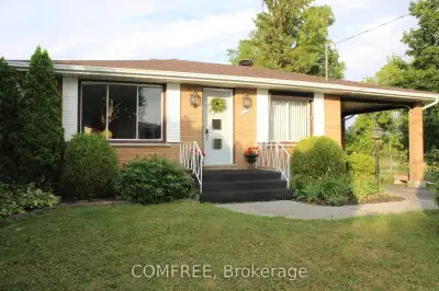 Beautiful, well built east end bungalow with large carport, on a quiet street adjacent to a park. Th...