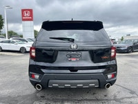 Conquer every adventure with the rugged yet refined 2023 Honda Passport TrailSport, a vehicle engine... (image 5)