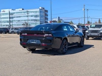 This brand new 2026 Dodge Charger Scat Pack Blacktop delivers an aggressive blend of modern performa... (image 6)