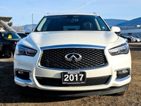 The 2017 INFINITI QX60 AWD in elegant white is a true performer with its reliable all-wheel drive an... (image 3)