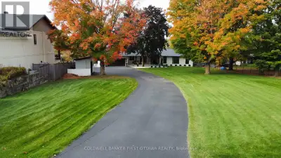 Welcome to 1060 River Road - a fully renovated, turn-key waterfront bungalow on a rare 3/4th of an a...