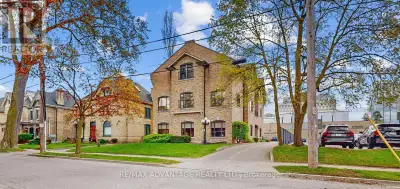 Prime Central Location directly across from Victoria Park, adjacent to City Hall, this custom design...