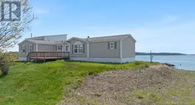 Stunning one-of-a-kind Ocean Front 4 Bedroom home. Enjoy one level living in comfort and luxury with...