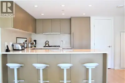 This lavish two bedroom two bathroom furnished condo in North Vancouver's Centreview building offers...