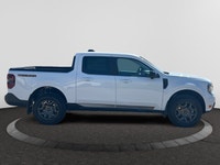 Check out this vehicle's pictures, features, options and specs, and let us know if you have any ques... (image 5)