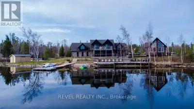 Experience the ultimate four-season waterfront living with this extraordinary private island retreat...