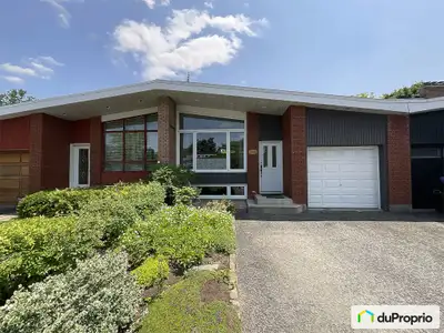 Découvrez cette charmante demeure maison de ville au style plafond cathédrale et à paliers multiples...