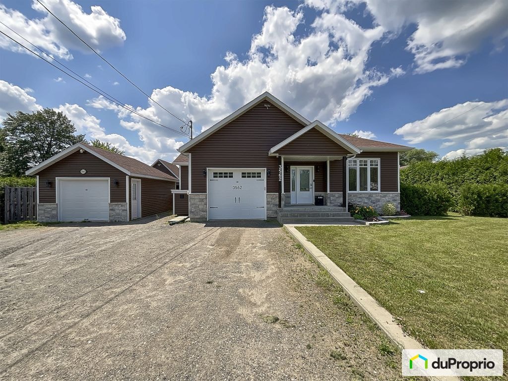 $450,000 - Bungalow for sale in Herouxville — photo 1