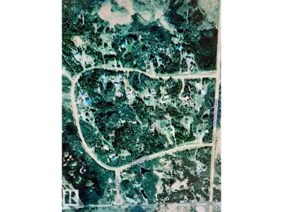 3. 77 acre treed Building Lot in Juniper Hills (lot 24). Perfect to build a walkout . West exposure,...