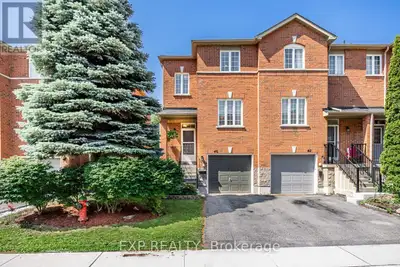 Experience the rare feel of a semi-detached home in this beautifully maintained end-unit townhouse,...