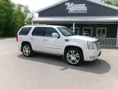 HERE'S A 2011 CADILLAC ESCALADE PLATINUM SERIES ALL WHEEL DRIVE, THIS ONE IS BEAUTIFUL INSIDE AND OU...