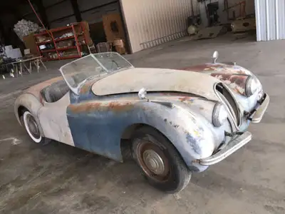 je suis a la recherche d’une jaguar 2 porte dans les années 1948-1976 convertible ou coupe jaguar xk...