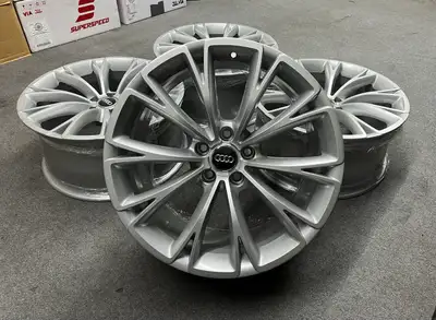Beautiful set of original Audi wheels in silver made by Ronal. Wheels will fit other Audi and VW mod...