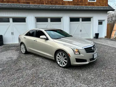 I am selling a clean 2013 ATS 2.5L, luxury RWD. The car sports the classy 2 tone light platinum and...