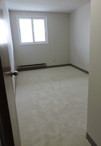 This one-bedroom apartment has a spacious living room/dining room,a full bathroom, and kitchen with... (image 8)