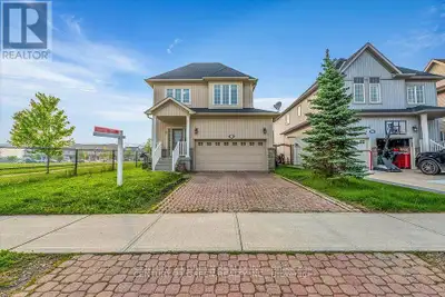 Modern Elegance Meets Nature in Fergus! The 2-storey home beside Ryan Park features hardwood floors,...