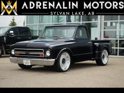 --DRIVE THE DREAM THIS SUMMER AT ADRENALIN MOTORS! NOW LOCATED IN GASOLINE ALLEY, RED DEER!-- GROUND...