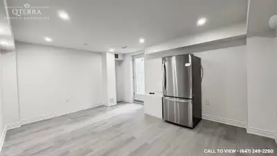 MODERN 2+DEN BASEMENT APARTMENT IN PRIME LOCATION