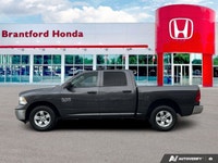 Command the road with this 2022 Ram 1500 Classic SLT Crew Cab, boasting a powerful 3.6L Pentastar VV... (image 1)