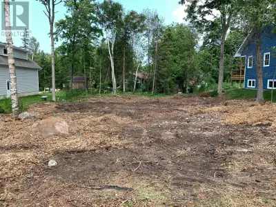 Discover the perfect canvas for your dream home or cottage, just a short walk from the sparkling sho...