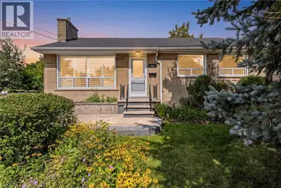Calling All First-Time Home Buyers, Empty-Nesters, Downsizers ... this charming brick BUNGALOW sits...