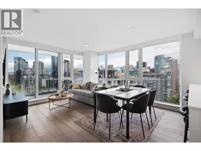 Welcome to this stunning 2 BED/2 BATH NW corner residence at 8X On The Park, architecturally strikin...