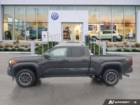 This Toyota Tacoma boasts a Intercooled Turbo Regular Unleaded I-4 2.4 L/146 engine powering this Au... (image 1)