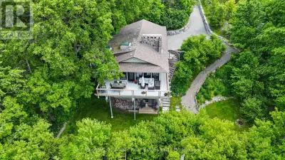 Attention commuters! Exceptional one-of-a-kind custom-built residence, tucked away in a truly privat...