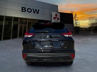 The 2025 Mitsubishi Eclipse Cross NOIR S-AWC in a striking Black hue offers a 4x4 drivetrain that pr... (image 5)