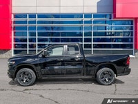 Odometer is 12404 kilometers below market average! Diamond Black Crystal Pearlcoat 2025 Ram 1500 Tra... (image 1)