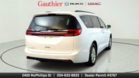 The 2022 Chrysler Pacifica Touring L is a family-friendly minivan that offers a comfortable ride, a... (image 2)