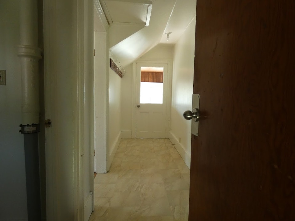 Spacious 1-Bedroom Upper Apartment with 4-Season Sunroom 2