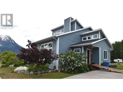 * PREC - Personal Real Estate Corporation. Beautifully designed 4-bed, 3-bath home. Bathed in natura...