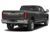 The 2026 Ram 3500 Laramie, in a sophisticated gray hue, features a robust 4x4 drivetrain for excepti... (image 1)