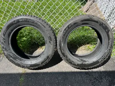 Pair of Hankook Winter Pike RS tires 205/65R16 95T Average tread depth of 4mm or 6/32”