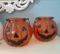 Pair of orange glass pumpkin Halloween jack-o-lantern holders