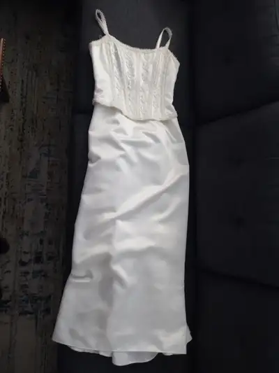 Wedding dress off the rack. Tailored for 5'6" 136 pound person wearing 1.5" heels. Some yellowing wh...