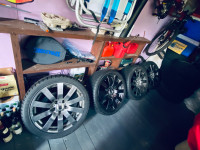 Four rims with tires for sale