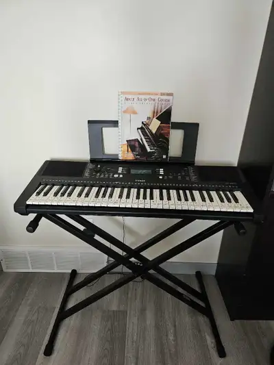 Yamaha 61 key keyboard, stand and level 1 lesson book, View more